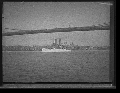 U.S.S. Iowa passing under Brooklyn Bridge