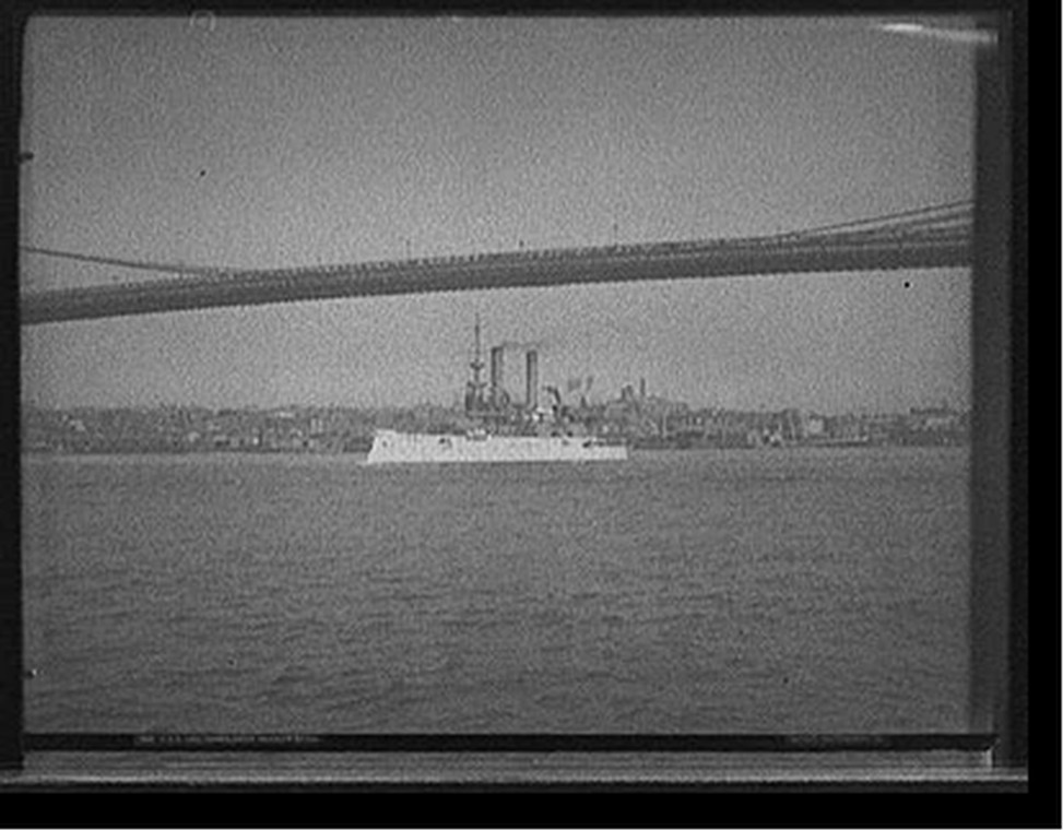 U.S.S. Iowa passing under Brooklyn Bridge, [between 1897 and 1901] — historic photograph