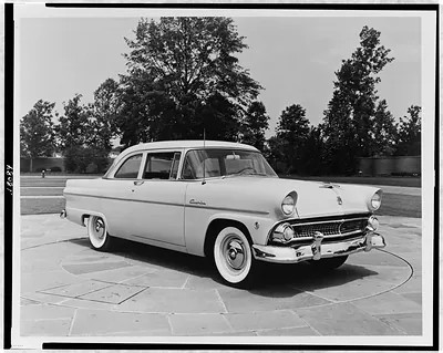 [A 1955(?) sedan Ford automobile]