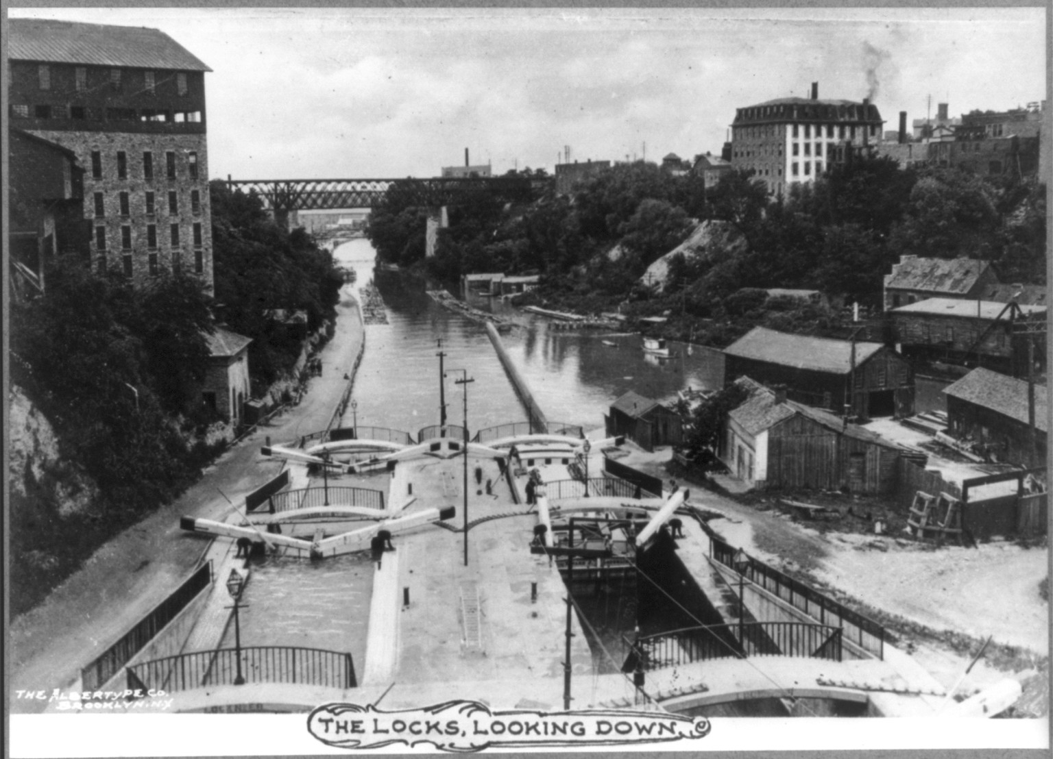 New York. Lockport. The locks, locking down — historic photograph