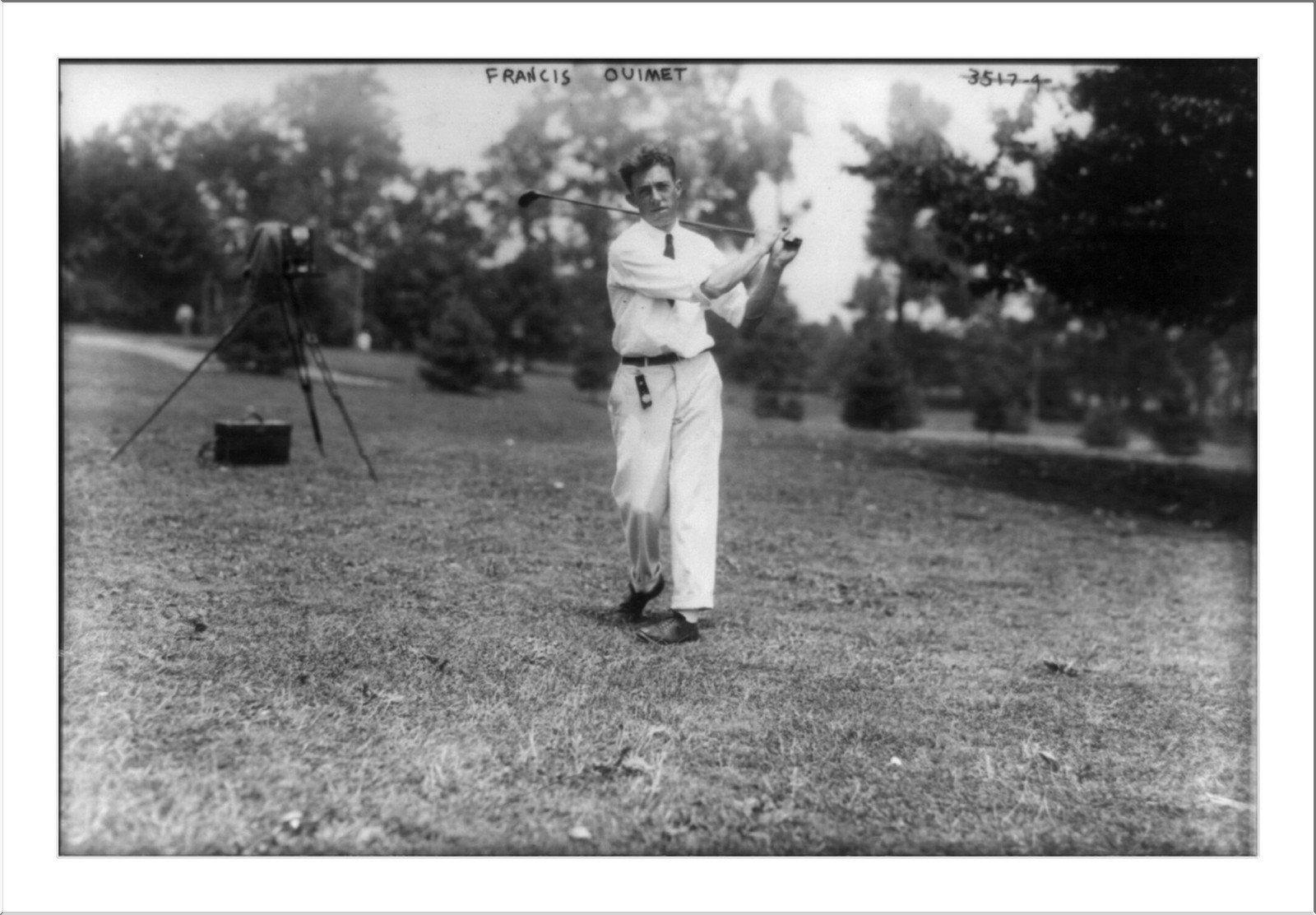 Sports - Golf - Francis Ouimet [swinging golf club], [between 1908 and 1914] — historic photograph