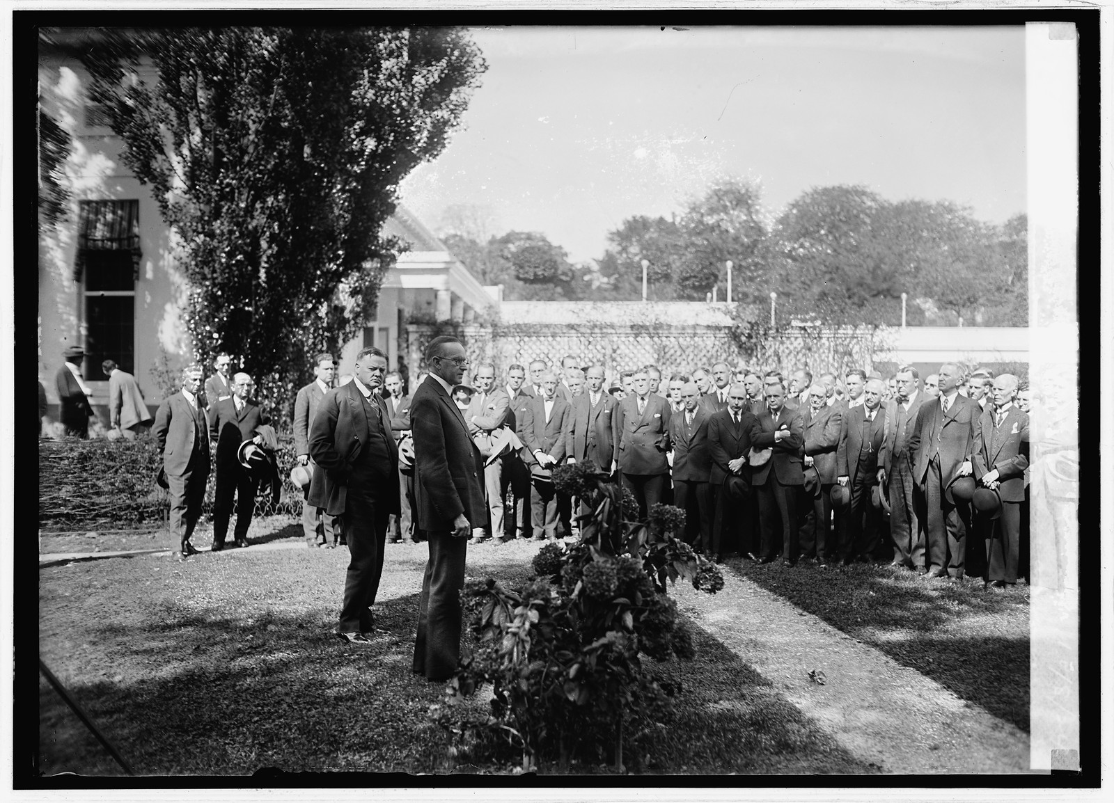Hoover & Coolidge - Coolidge addressing radio men at White House, [Washington, D.C.], 10, [19]24 October 8. — historic photograph