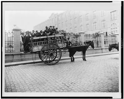 [Immigrants being transported on horse-drawn wagon, Buenos Aires, Argentina]