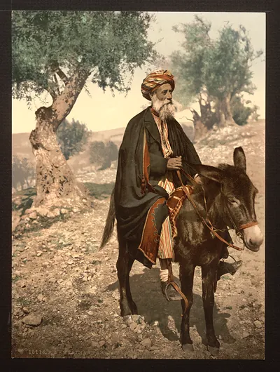 Native of Bethlehem on his donkey Holy Land (i.e. West Bank)