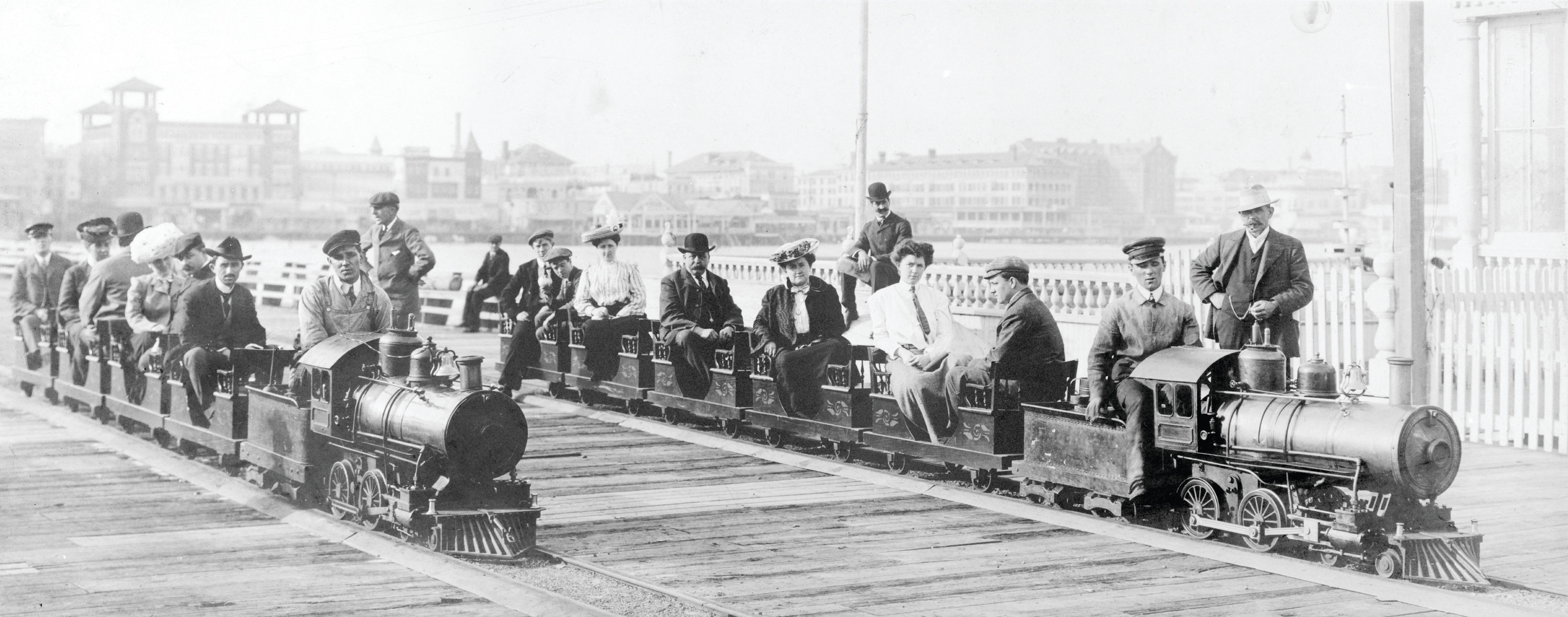 [People on two miniature railroad trains on bridge or pier, possibly at Dreamland, Coney Island, New York City], c1903. — historic photograph