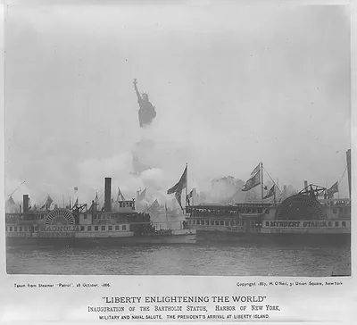 Liberty enlightening the world--Inauguration of the Bartholdi Statue, Harbor of New York--Military and naval salute, the President's arrival at Liberty Island