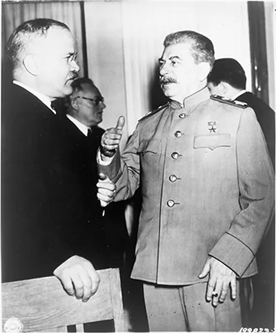 Thumbs up" as Stalin and Molotov confer"