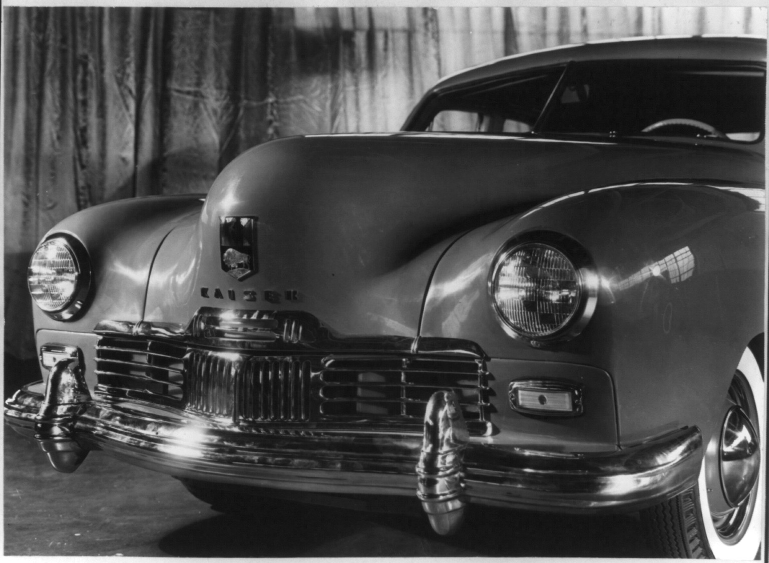 View of front of 1947 Kaiser automobile — historic photograph