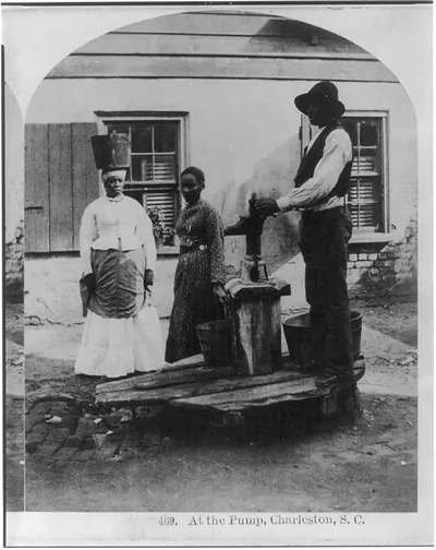 [African Americans working, Charleston, S.C.: At the pump - 3 African Americans at water pump]