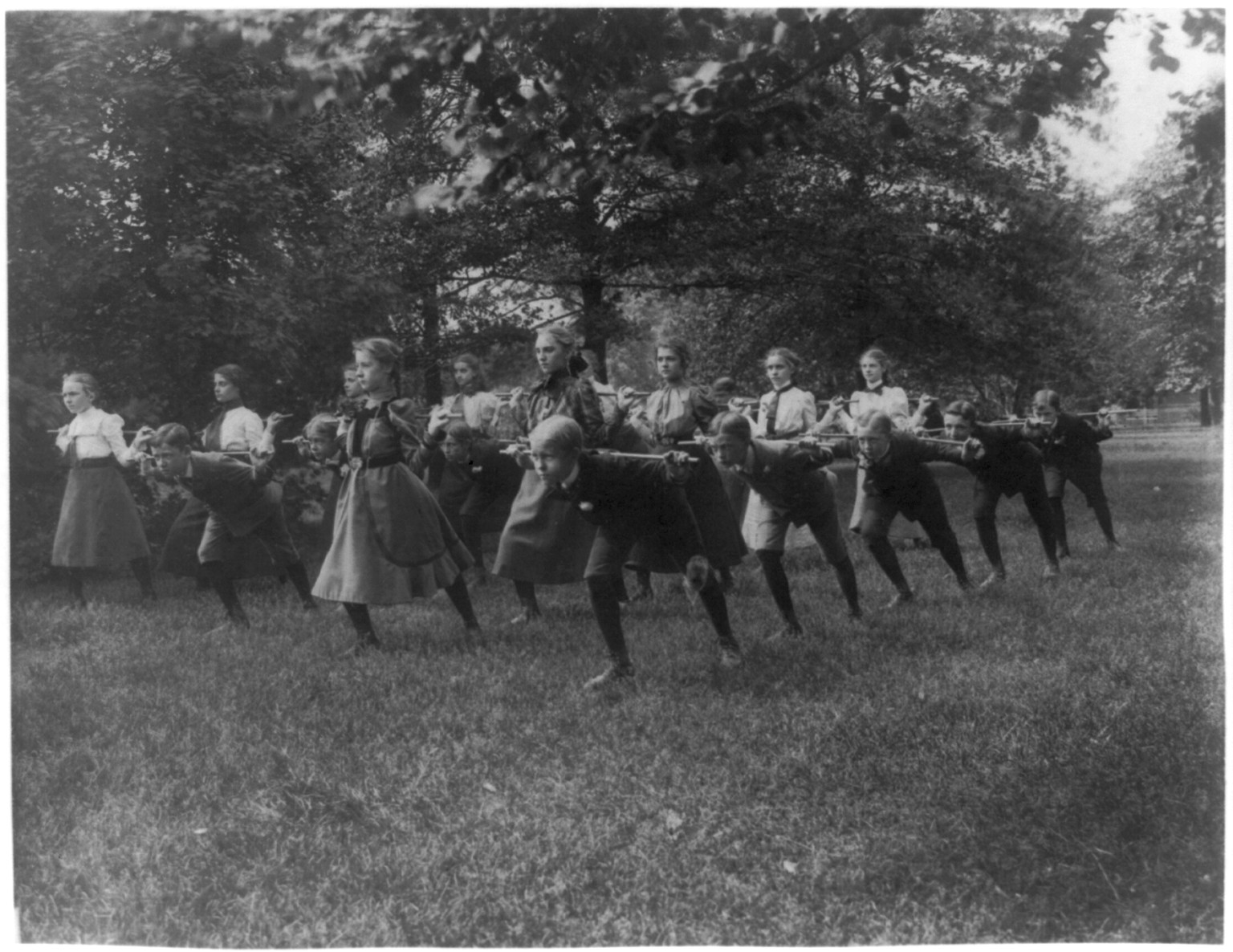 [Classroom scenes in Washington, D.C. public schools - outdoor exercise with rods - 3rd Division], [1899?] — historic photograph