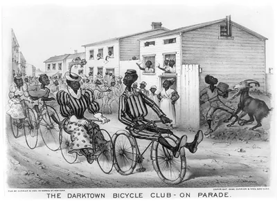 The darktown bicycle club - on parade: Hooray for de rumatic! Dont she glide lubly.""