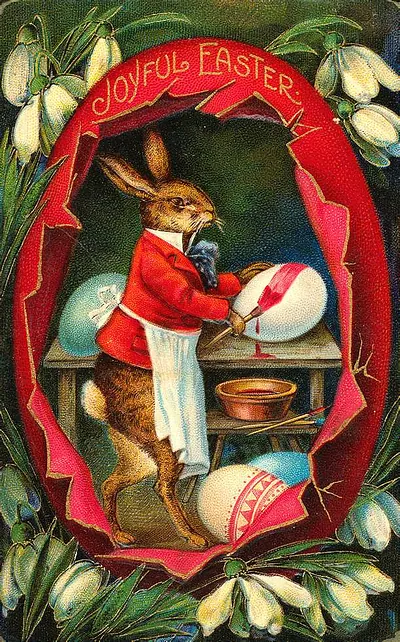 Joyful Easter greeting card with painting rabbit