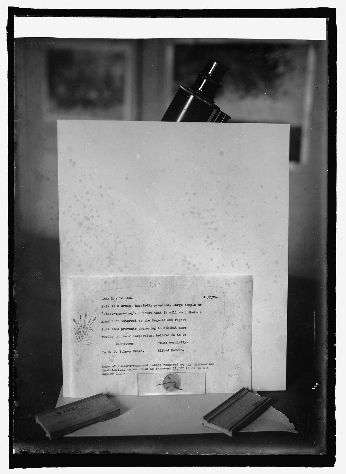 Letter contained in eye of needle at Natl. Museum, 12/17/24, [19]24 December 17. — historic photograph