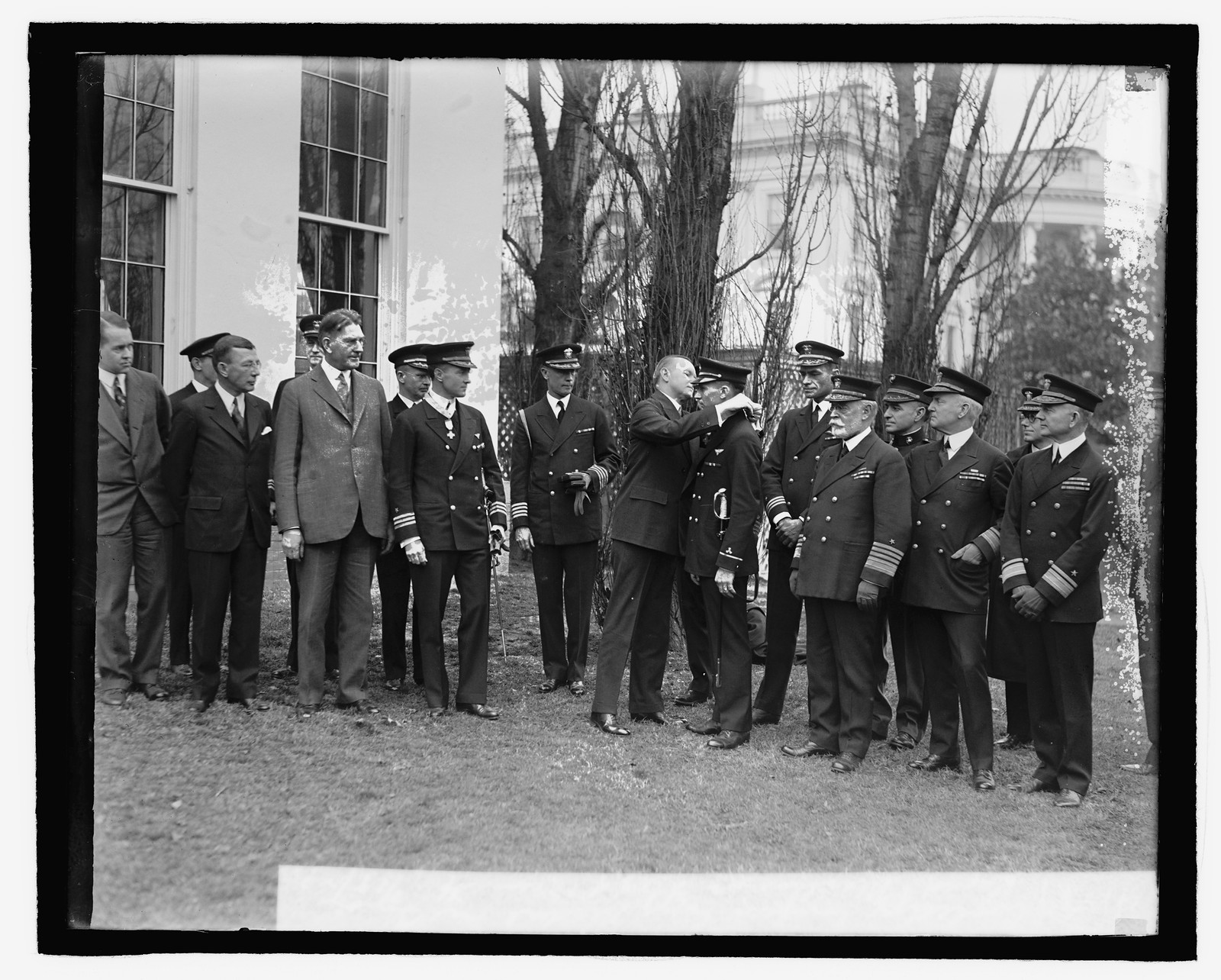 Coolidge confers Cong. Medal on Comdr. Byrd & machinists flag of Bennett, 3/19/27, [19]27 March 19. — historic photograph