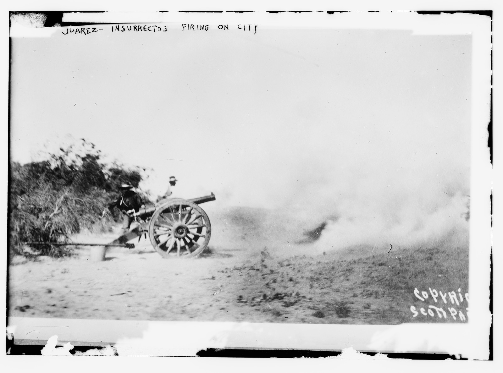 Firing on city, Juarez, n/a — historic photograph