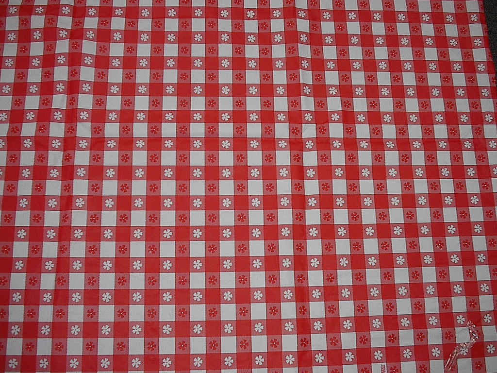 Red and white gingham tablecloth with small flower prints — historic print