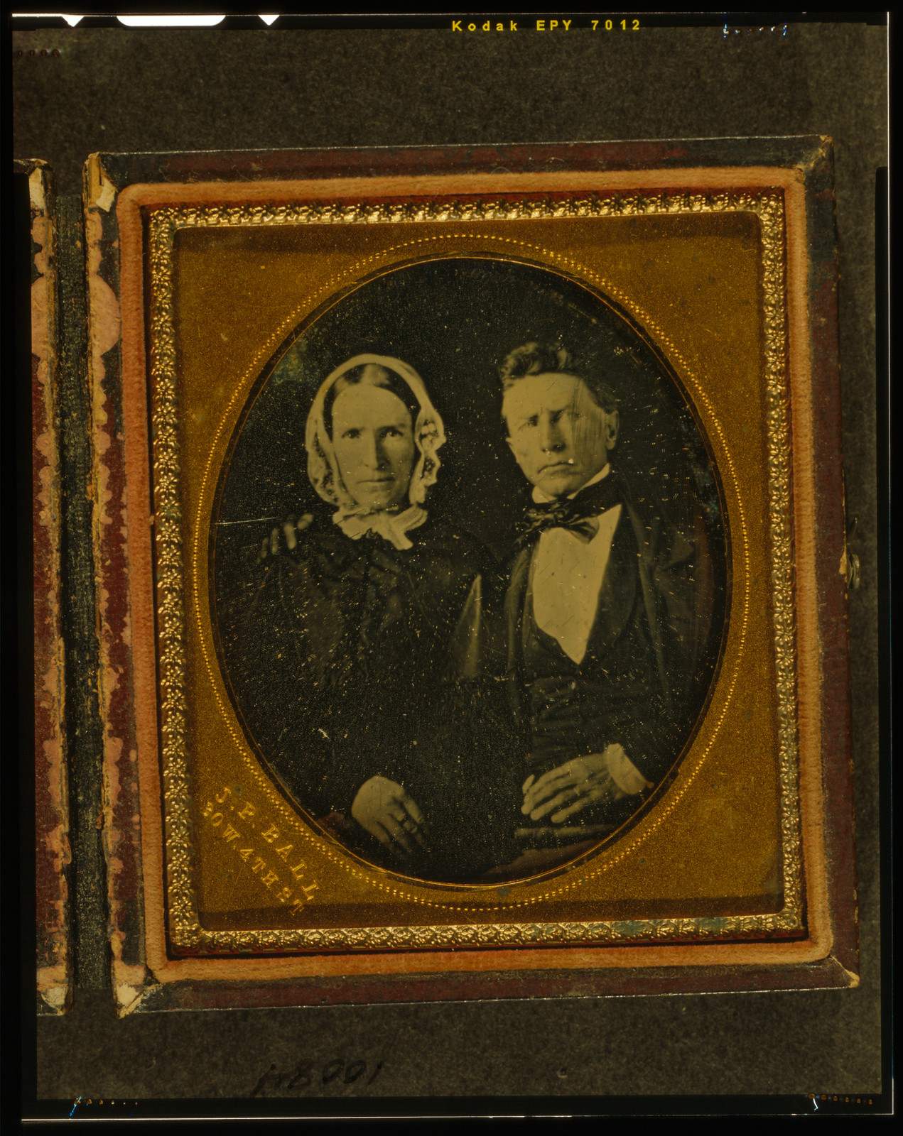 [Unidentified couple, the man with right arm around the woman's shoulder], [ca. 1862] — historic photograph