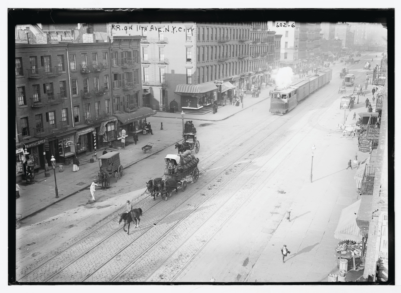 Railroad cars on 11th Ave., New York City, n/a — historic photograph