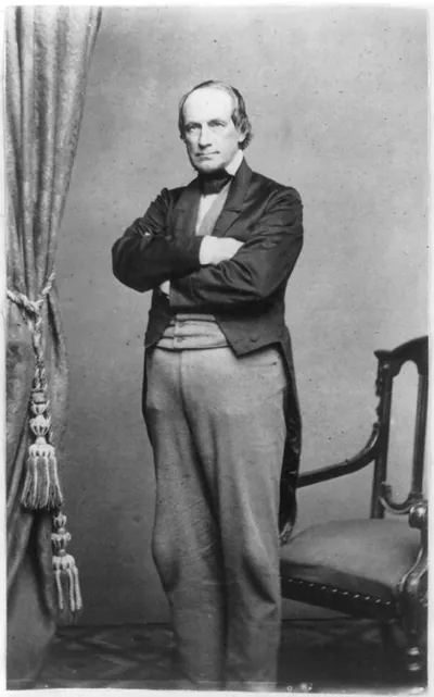 [Caleb Cushing, 1800-1879, full-length portrait, standing, arms folded, facing left]