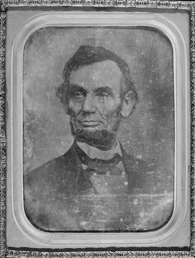 Daguerreotype portrait of a bearded man in an ornate case
