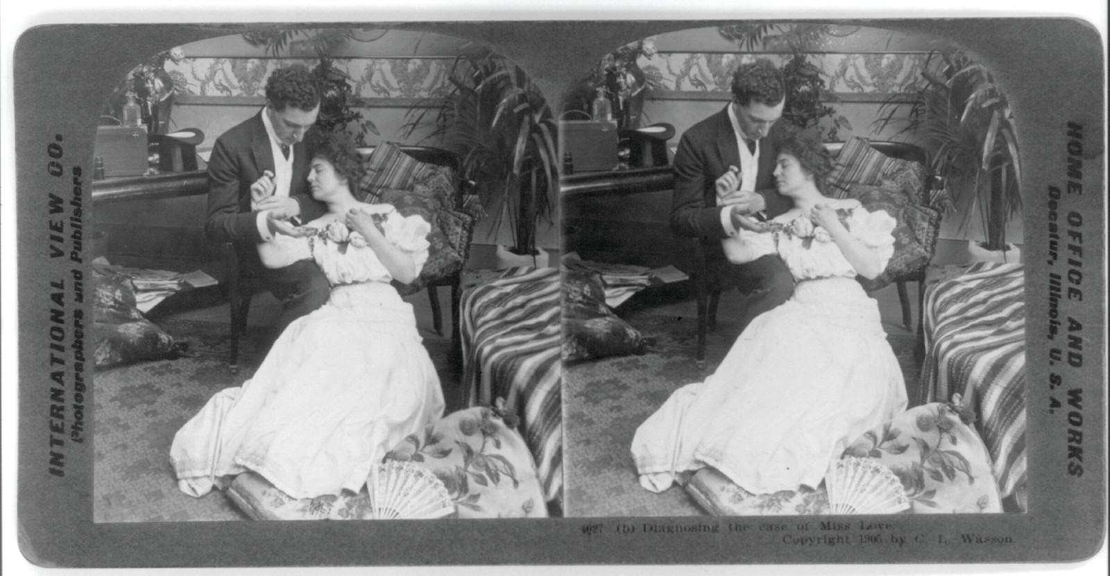 Stereoview of a couple in a parlor, man with a ring — stereograph