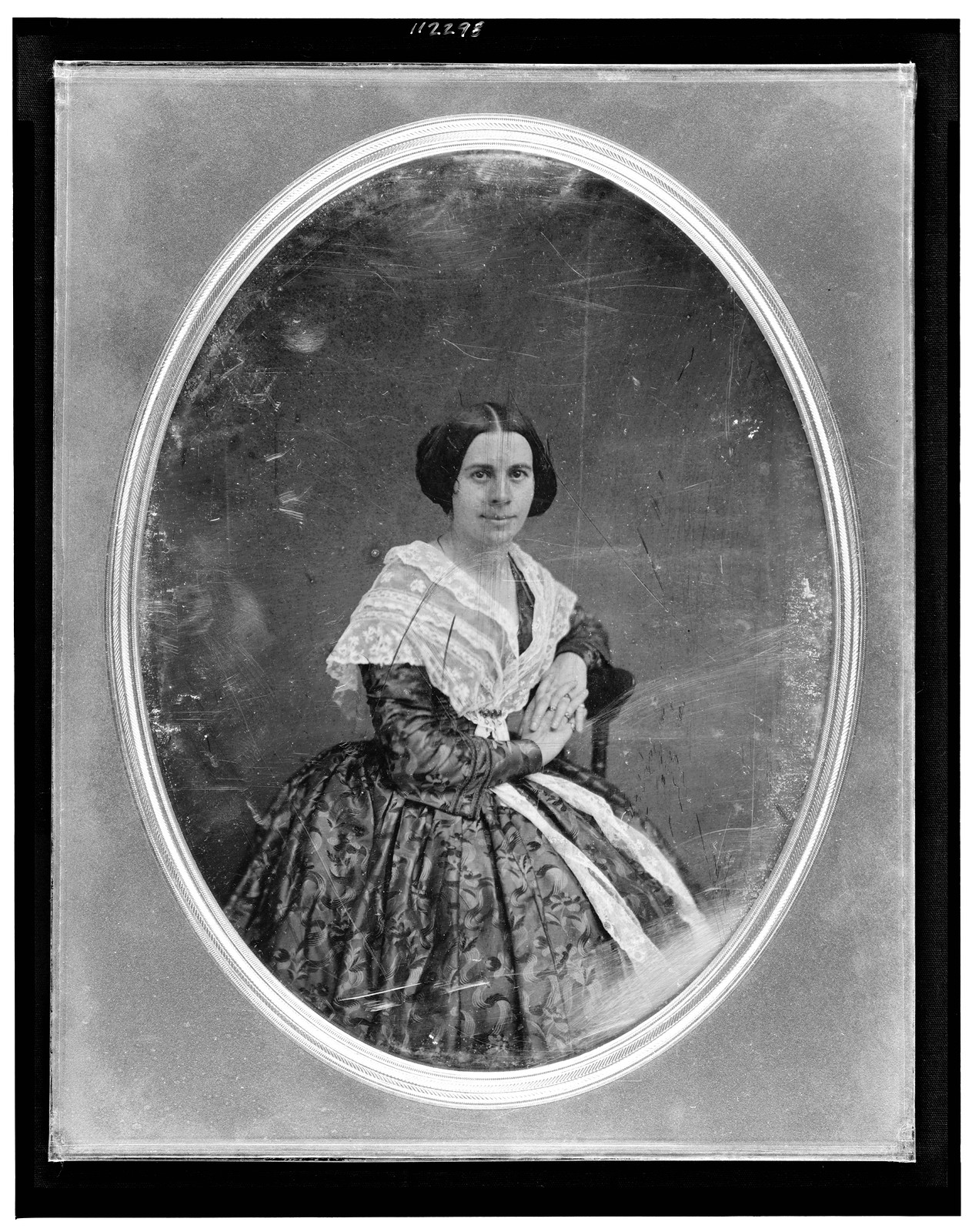 Seated woman with lace collar, daguerreotype portrait, 1844 — historic photograph