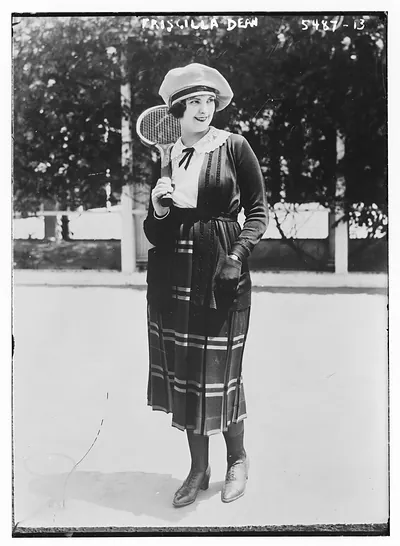 Priscilla Dean with tennis racket
