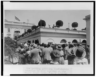Mrs. Harding greeting Confederate veterans as they arrived at the White House today