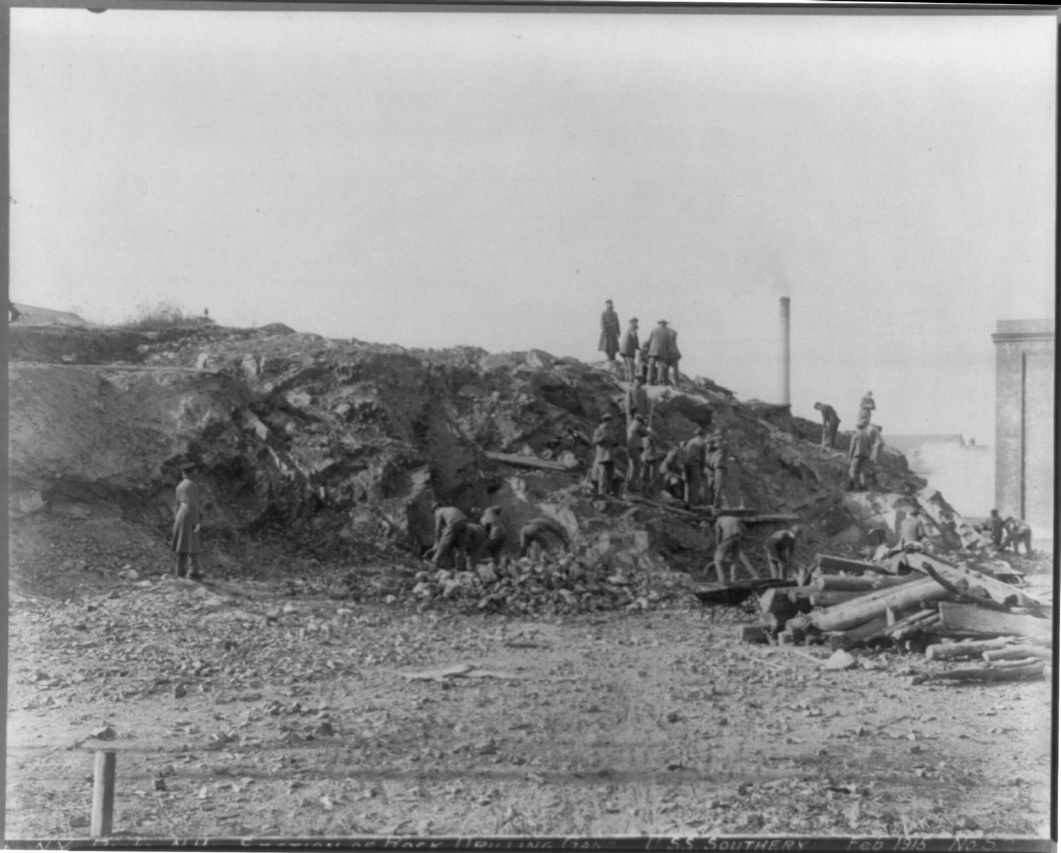 [U.S. Naval prison at Portsmouth, N.H., 1915-16: Rock drilling gang, U.S.S. Southerly] — historic photograph