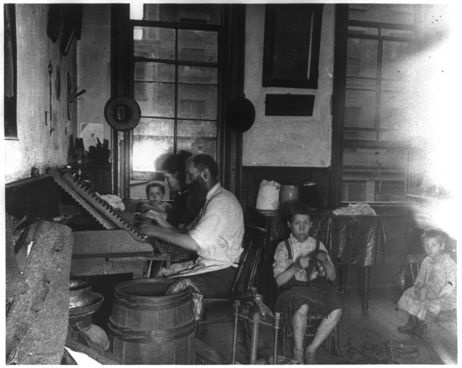 Bohemian cigarmakers at work in their tenement, [ca. 1889] — historic photograph