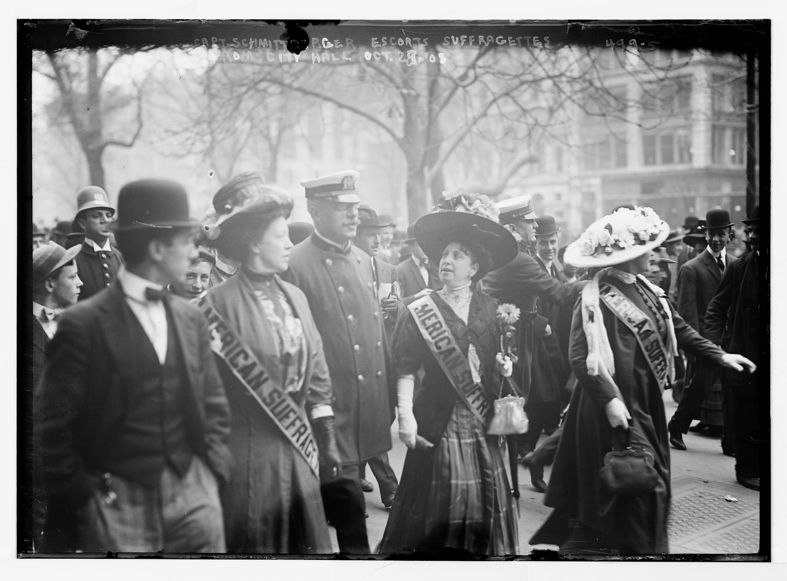 Capt. Schmittberger of police escorts suffragettes from City Hall, New York, 10/28/08. — historic photograph