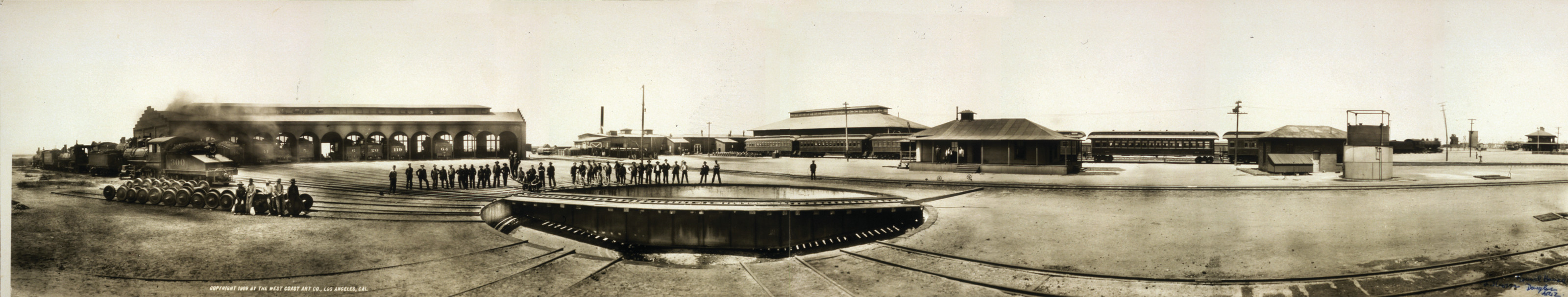 Panoramic view of railroad roundhouse and turntable — historic image