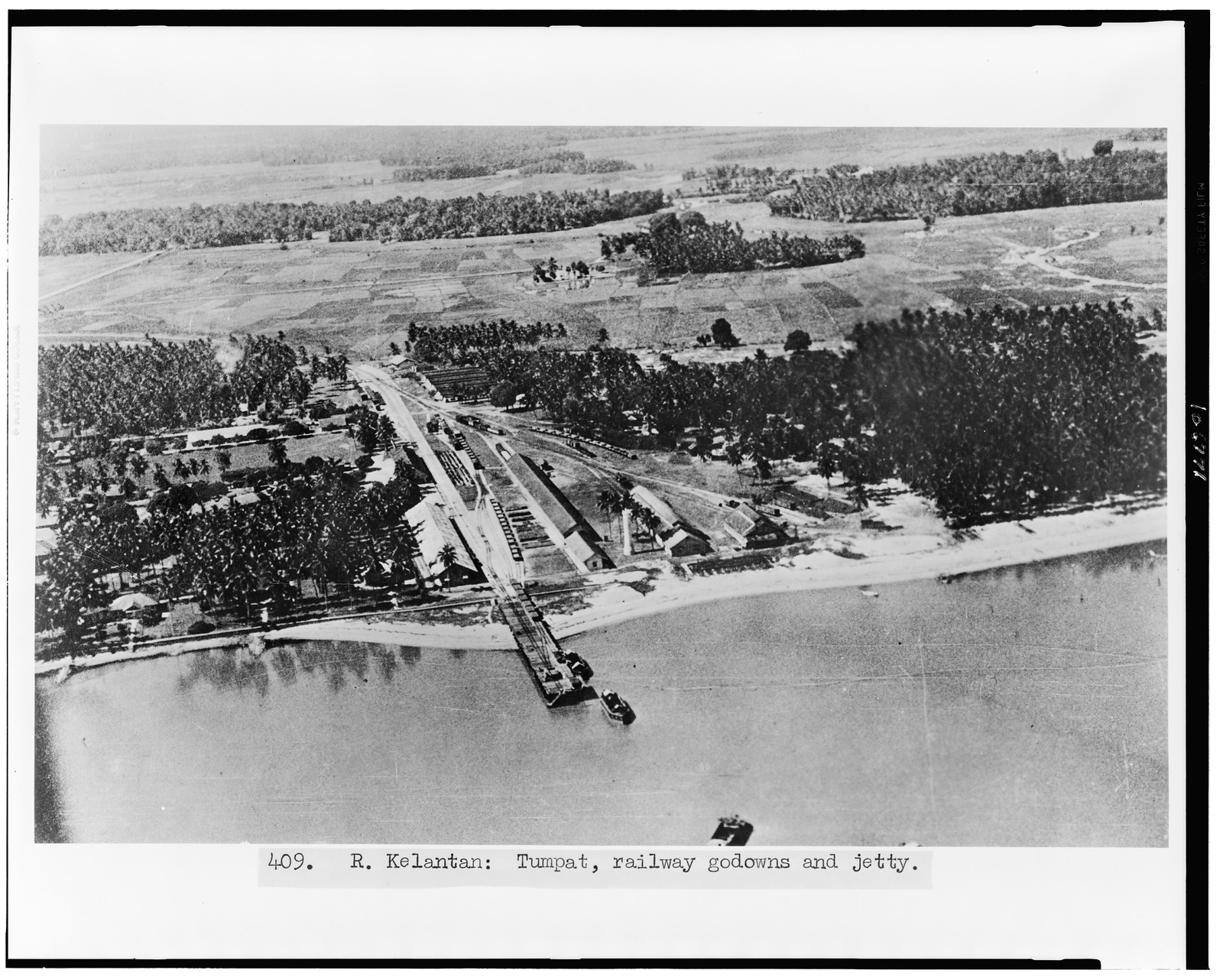 R. Kelantan: Tumpat, railway godowns and jetty, [ca. 1943] — historic photograph