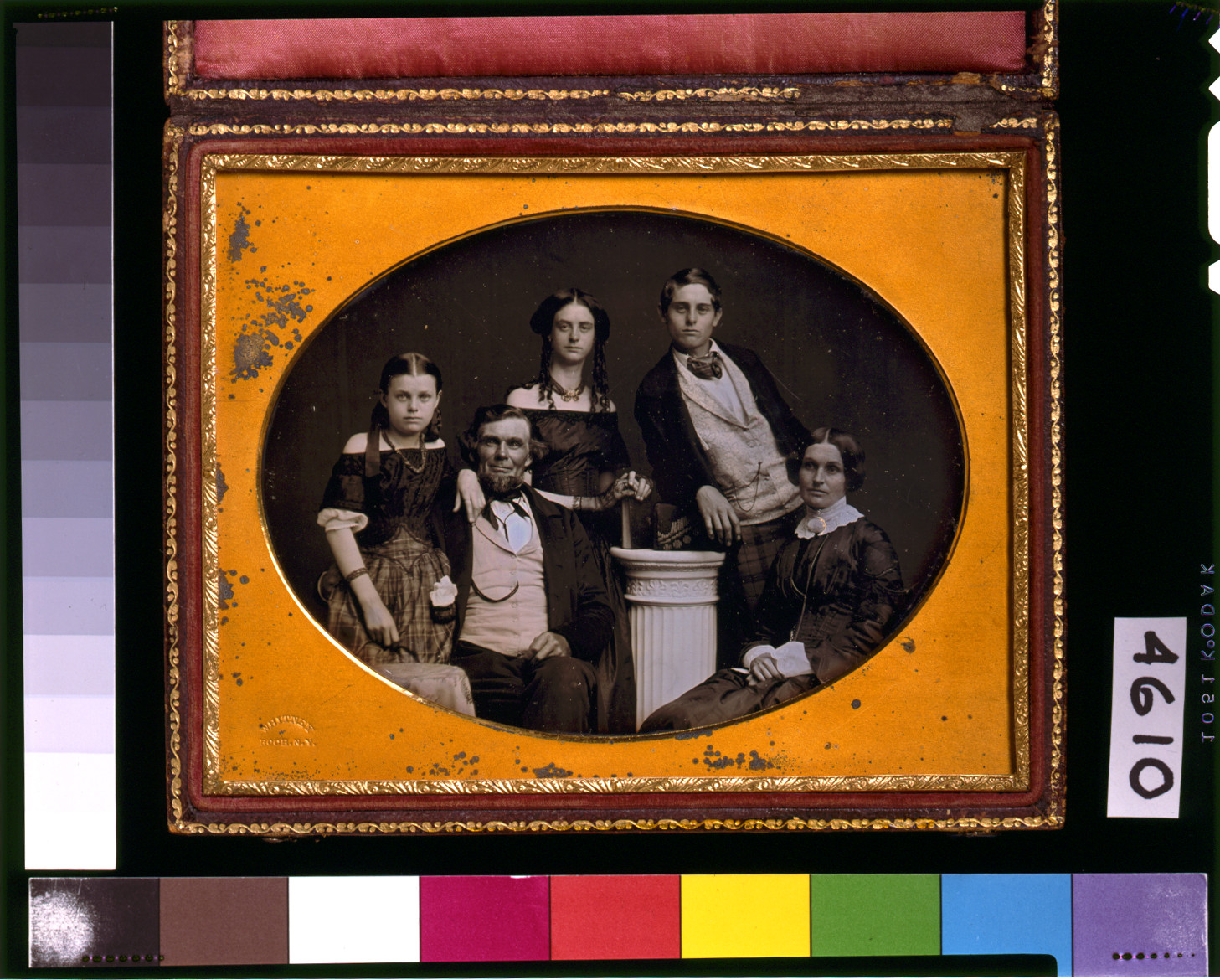 [Benjamin family group portrait, posed around a column], [between 1845 and 1858] — historic photograph