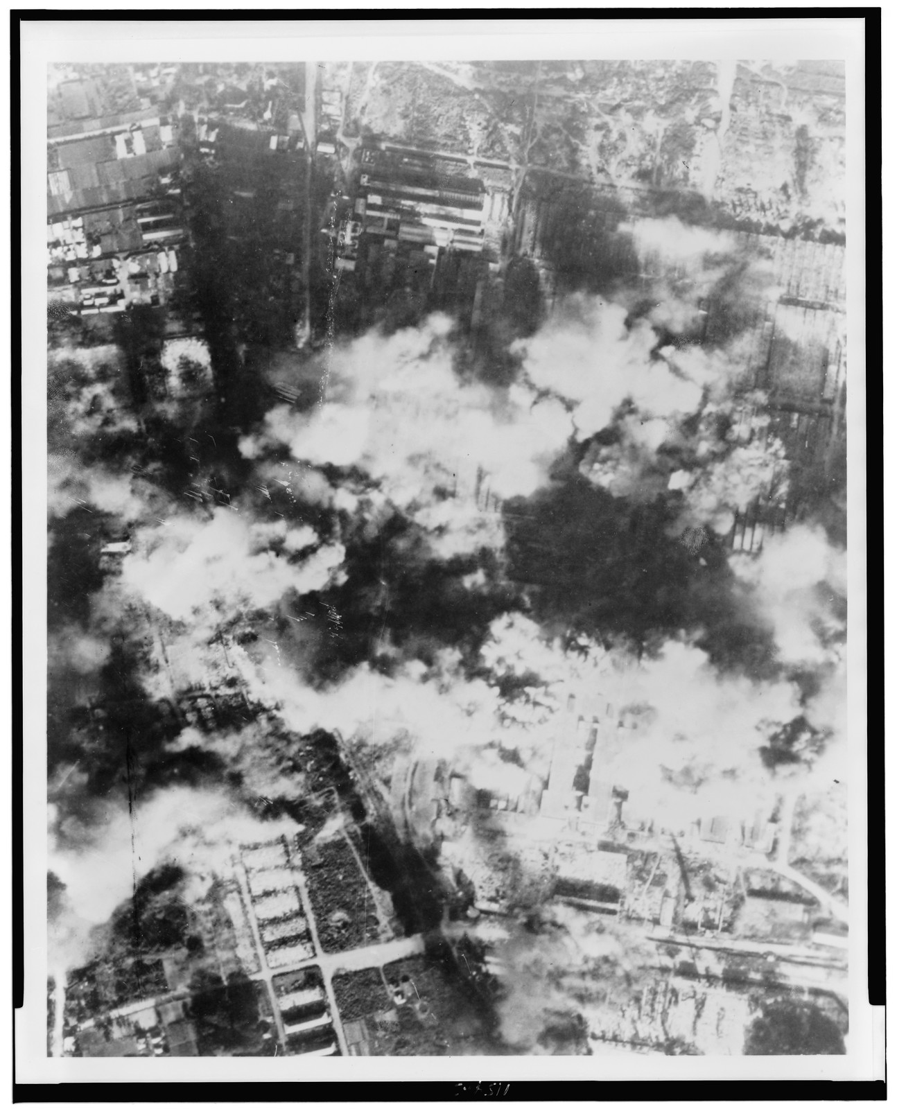 [Aerial view of bombing of Nakajima Aircraft Co., Musashino Plant, Japan], [1945] — historic photograph