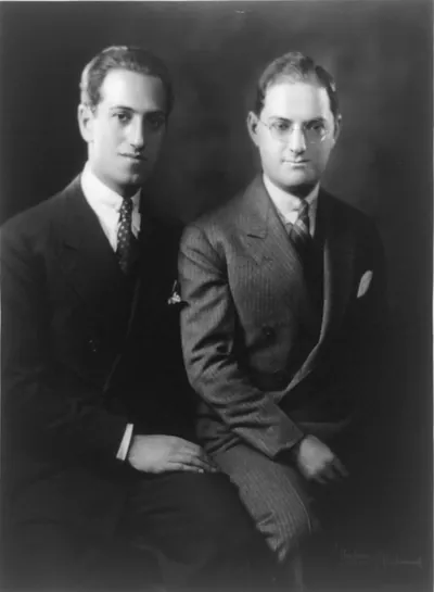 [Left to right: George and Ira Gershwin seated, three-quarter length portrait]