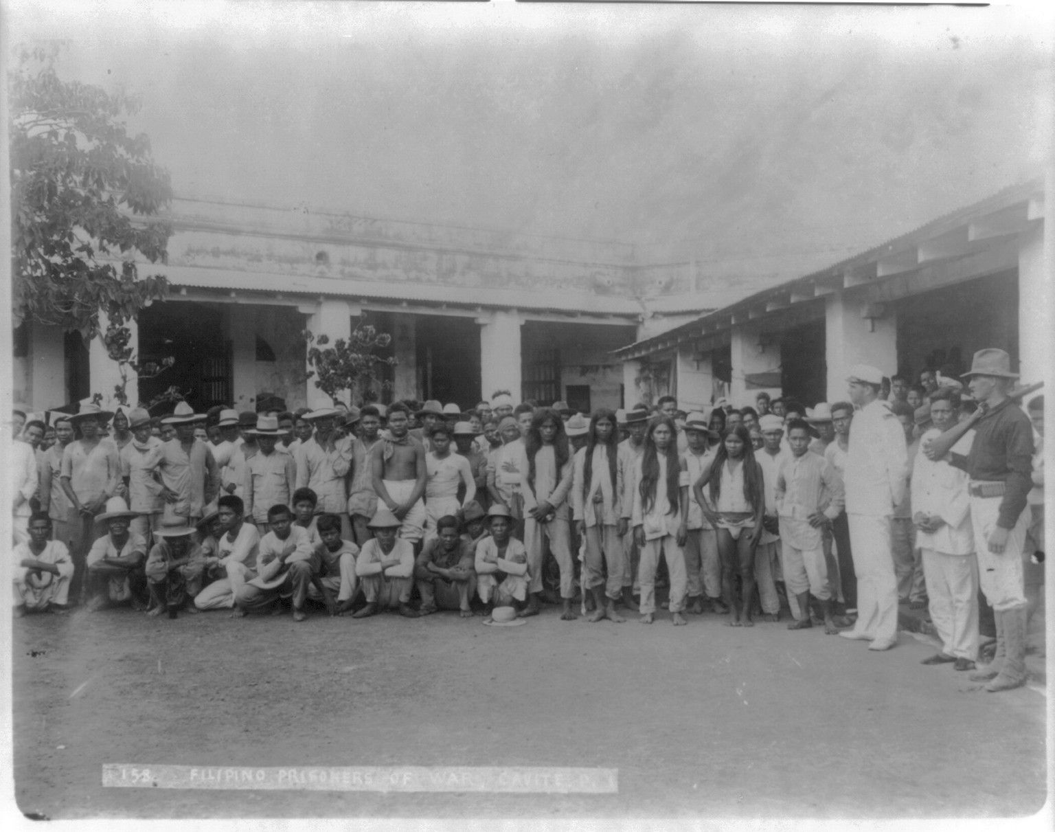 [Philippine Insurrection, 1899: Filipino prisoners, Cavite] — historic photograph