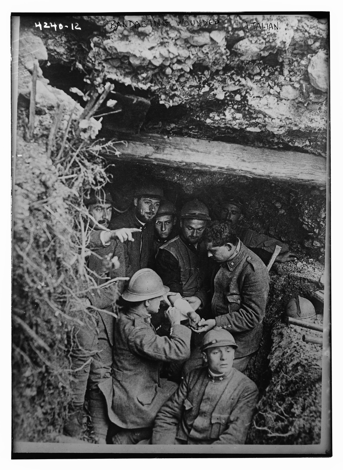 Bandaging wounded, n/a — historic photograph