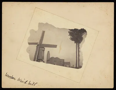 Woorden windmill with buildings and trees, handwritten caption