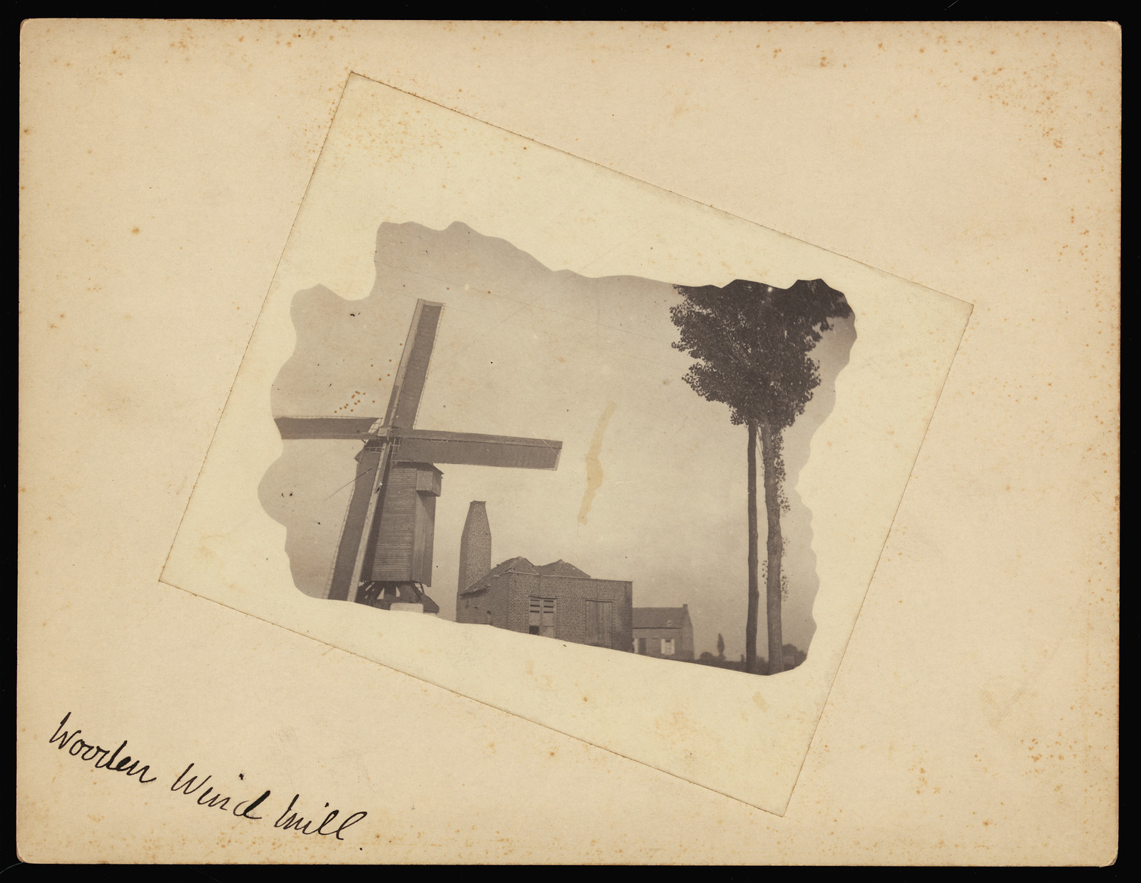 Woorden windmill with buildings and trees, handwritten caption — historic image
