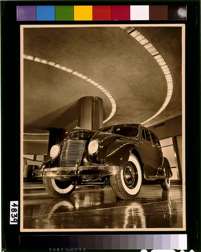 Chrysler Salon, N.Y.C. [1937 Chrysler Airflow four-door sedan in the showroom of the Chrysler Building]