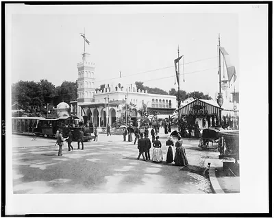 [View toward Pavilion of Algeria, showing passenger train and station on L'Esplanade des Invalides, Paris Exposition, 1889]