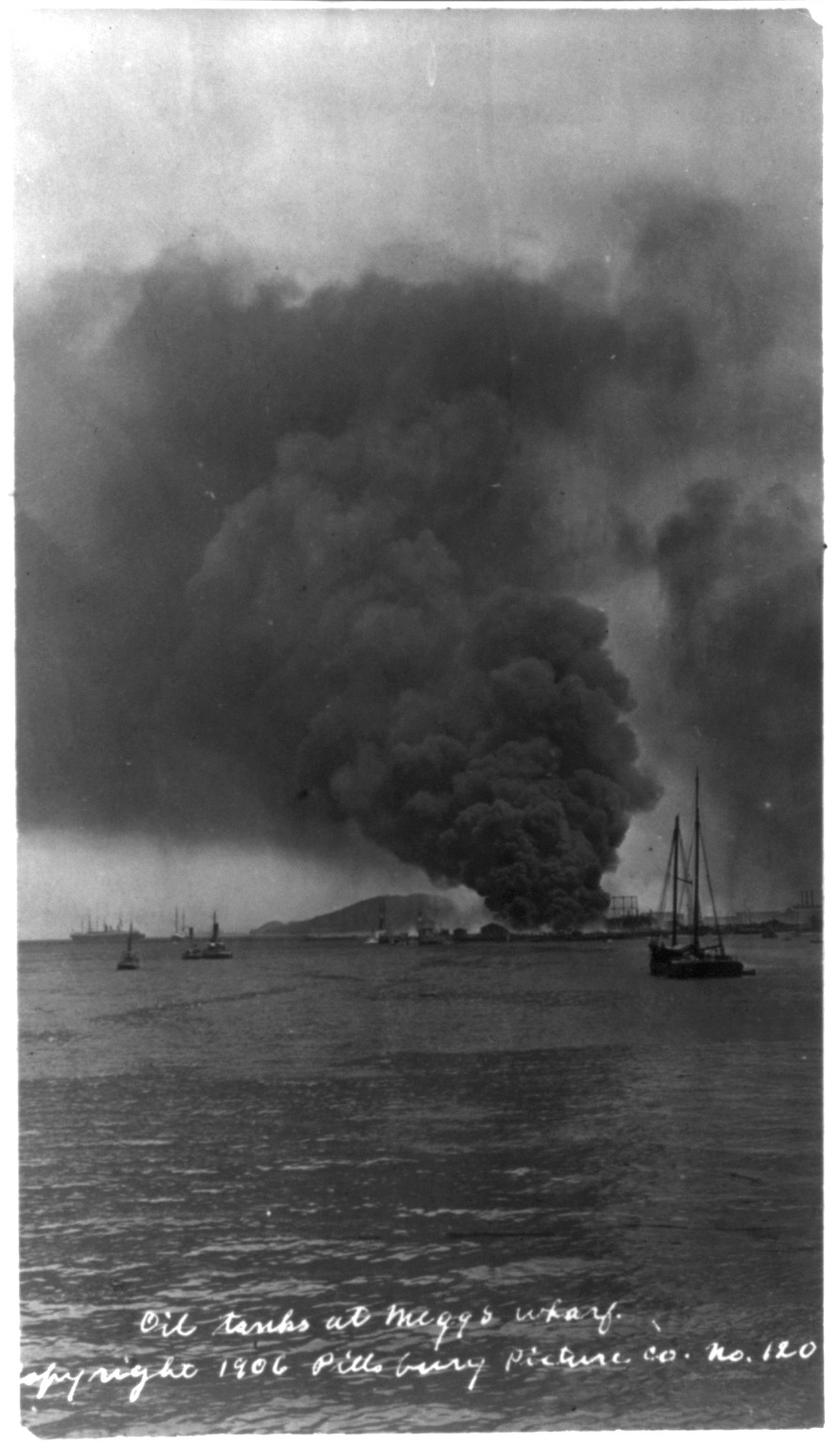 Oil tanks [burning] at Meggs Wharf, c1906. — historic photograph