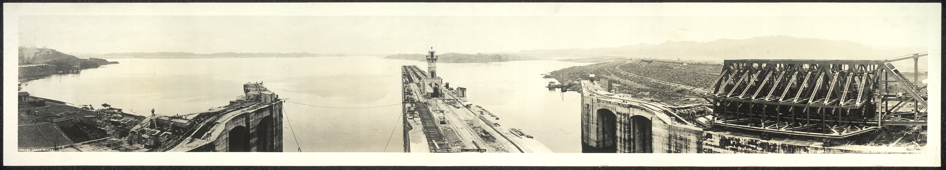 Panoramic photograph of Panama Canal locks and lake — historic photograph