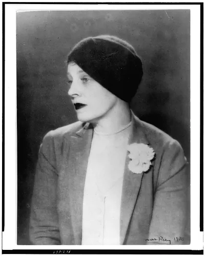 [Margaret C. Anderson, half-length portrait, facing left, wearing turban hat] / Man Ray.