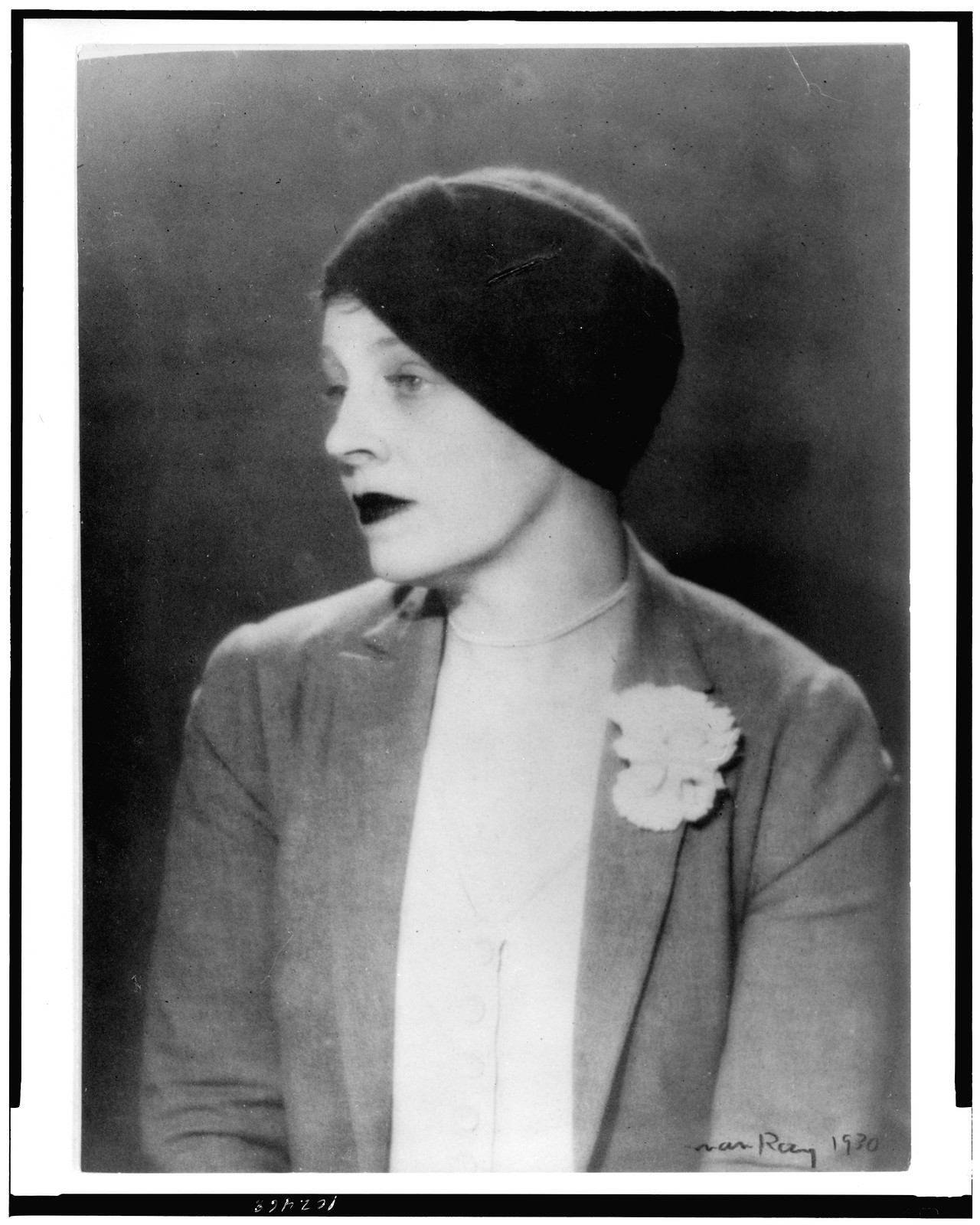 [Margaret C. Anderson, half-length portrait, facing left, wearing turban hat] / Man Ray., 1930 — historic photograph