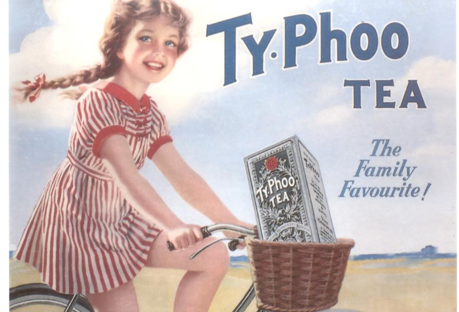 Ty-Phoo Tea advertisement with girl on bicycle — historic image