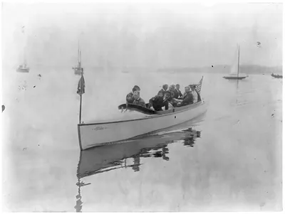 [New York - Oyster Bay, Long Island Yacht Club: small motor launch with ten aboard]