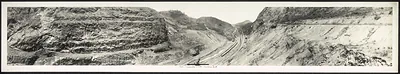 Panoramic view of a rocky railway cut, black and white photograph