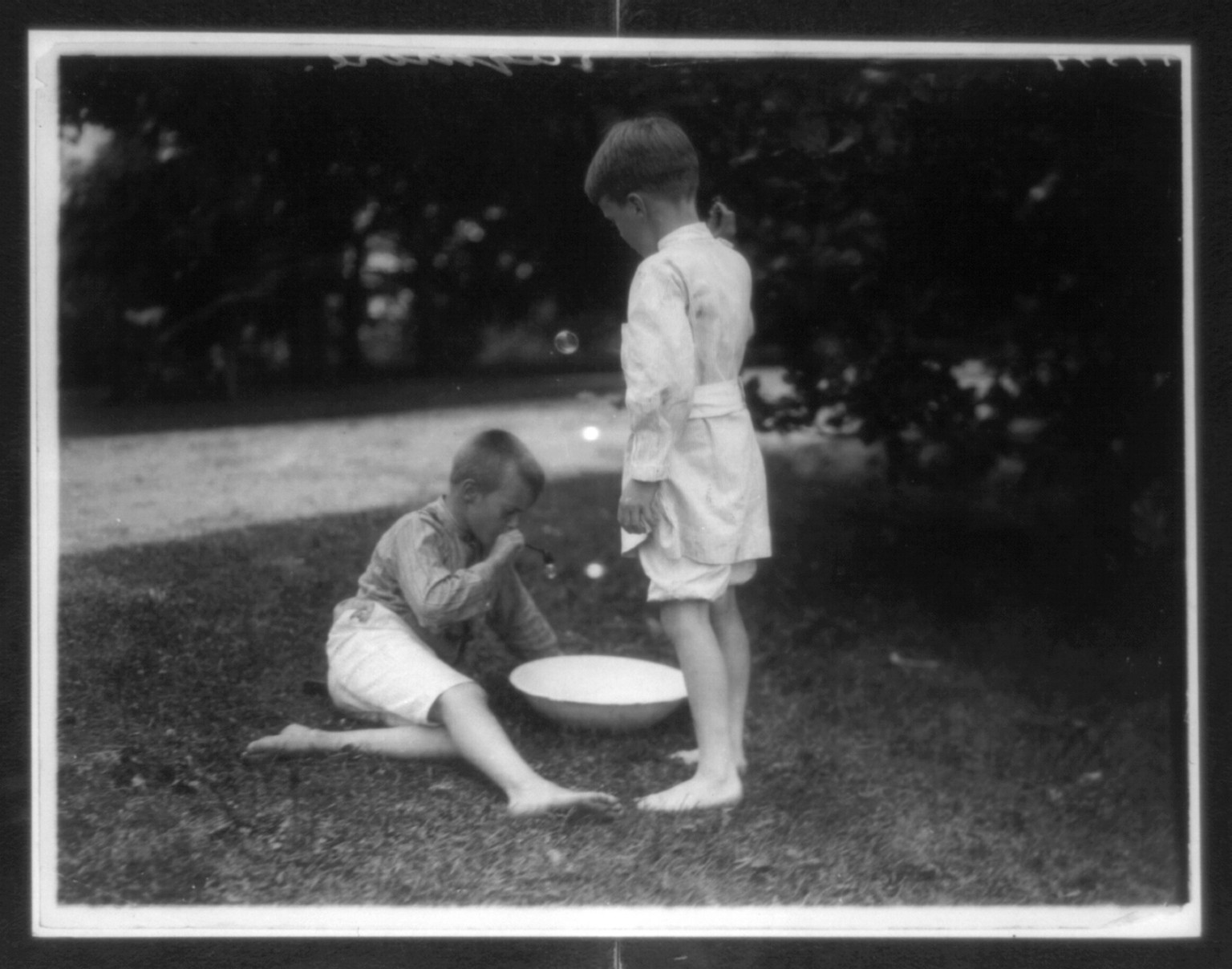 Archie and Quentin Roosevelt at Sagamore Hill, c1904. — historic photograph